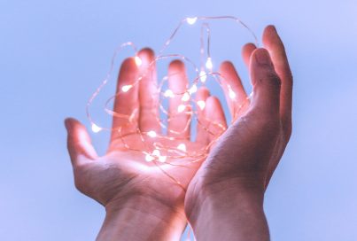 hands with lights