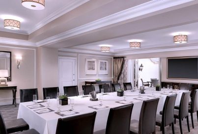 A white table set for a meal