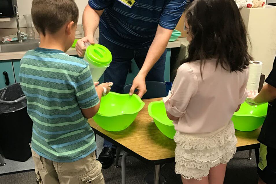 Children making soap in school
