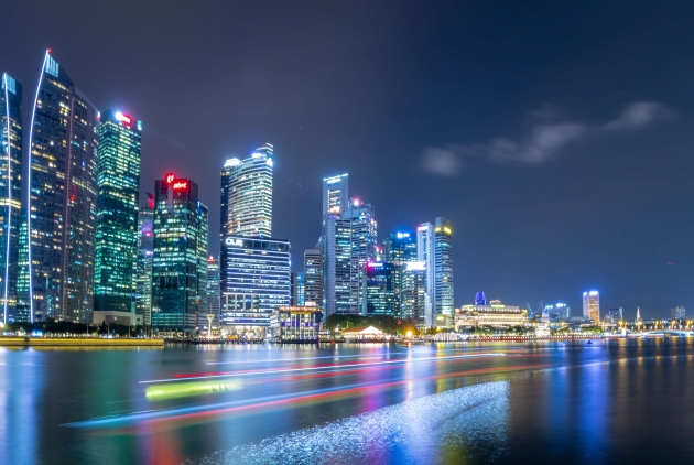 The central business district and Marina Bay in Singapore at night